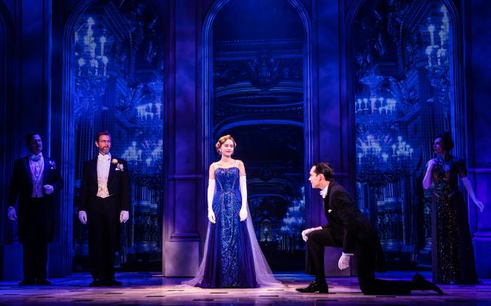 Lila Coogan (Anya), Stephen Brower (Dmitry) and the company of the National Tour of ANASTASIA. Photo by Evan Zi