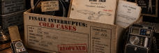 Star Trek Cold Cases evidence box containing an original-series communicator, tricorder, command insignia, film reels and the script for “Turnabout Intruder.”