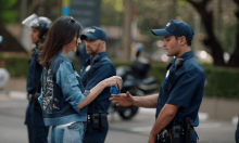Kendall Jenner Gives Policeman a Pepsi